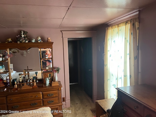 bedroom featuring a paneled ceiling