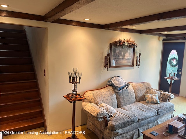 living room with beamed ceiling