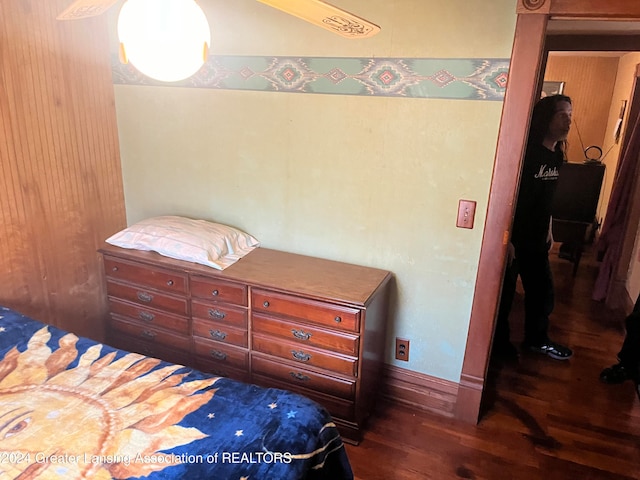 bedroom featuring dark hardwood / wood-style flooring