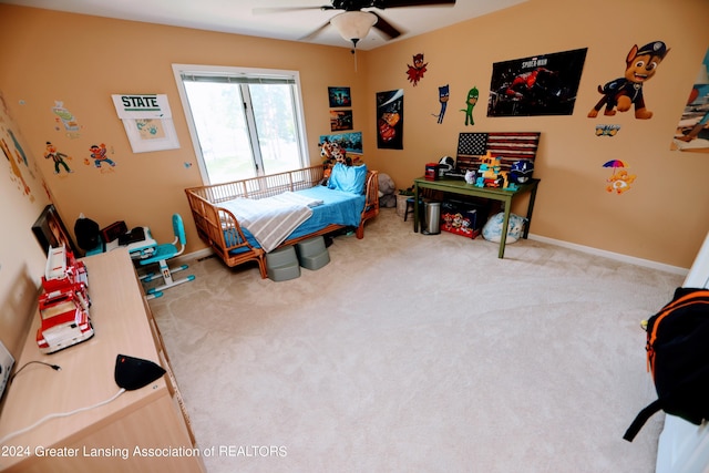 carpeted bedroom featuring ceiling fan