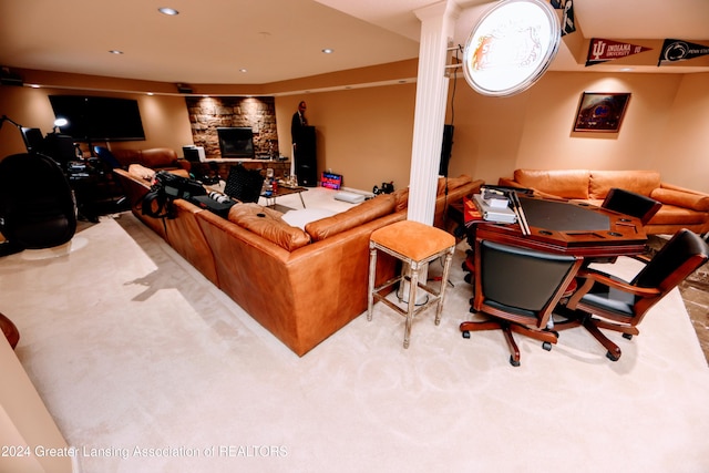 carpeted office space featuring a fireplace