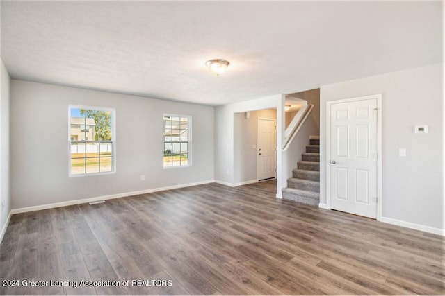 empty room featuring dark hardwood / wood-style floors