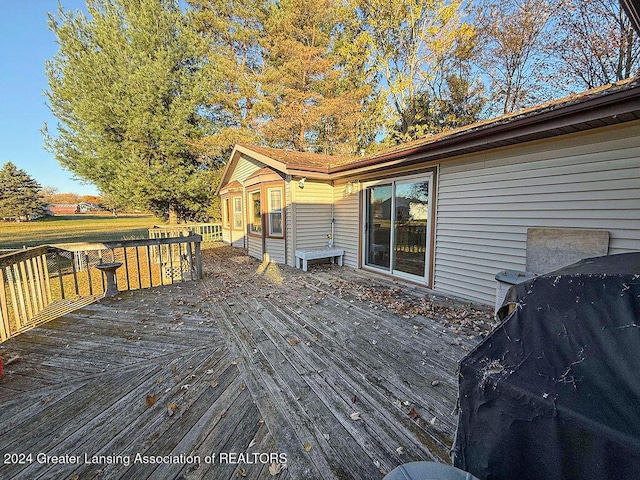 wooden terrace with grilling area