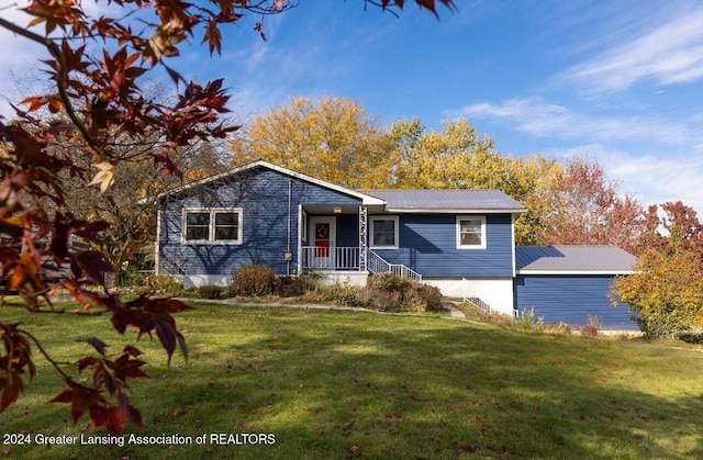 view of front of home featuring a porch and a front lawn