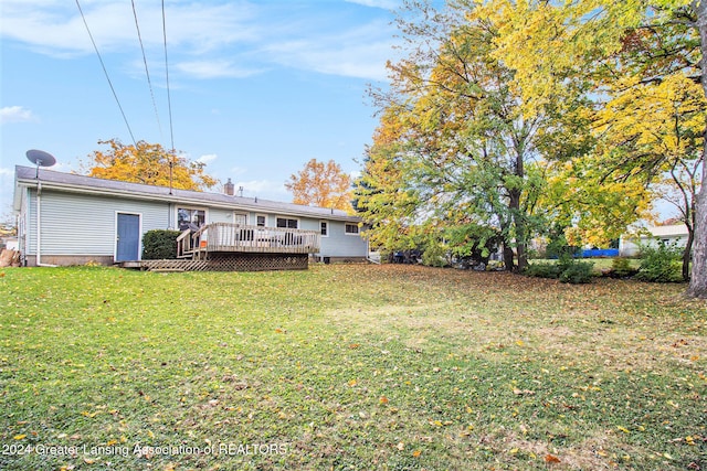 view of yard with a deck