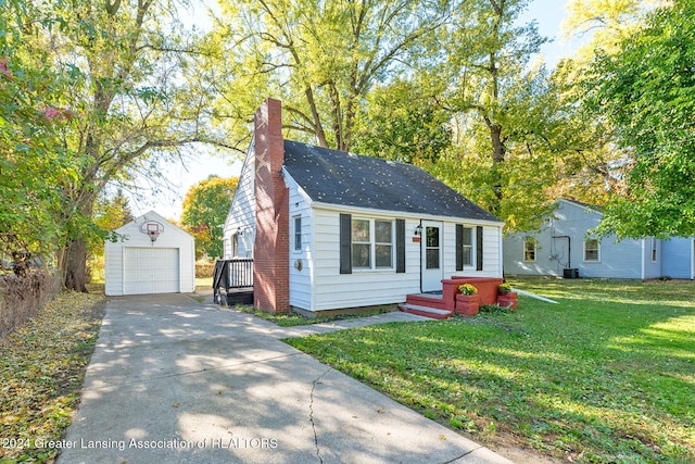 bungalow-style house with central air condition unit, a front lawn, an outbuilding, and a garage