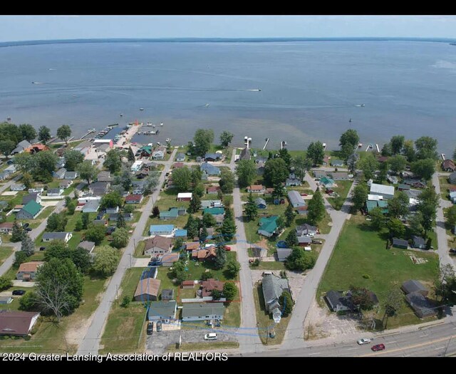 aerial view featuring a residential view and a water view