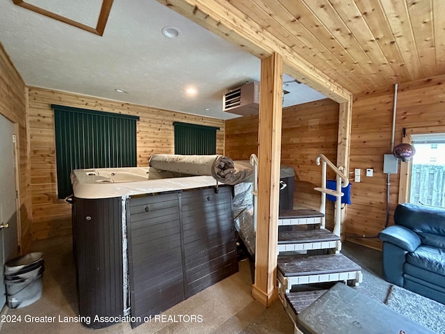 living room featuring wooden walls