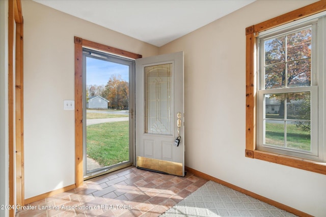 entrance foyer featuring plenty of natural light