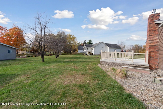 view of yard with a deck