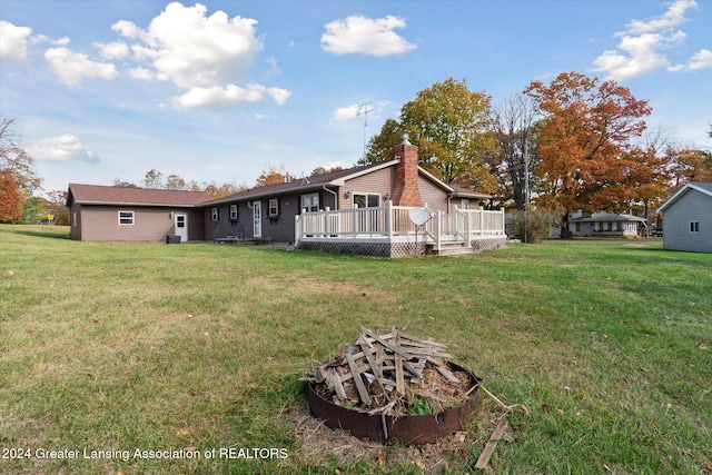 view of yard with a deck