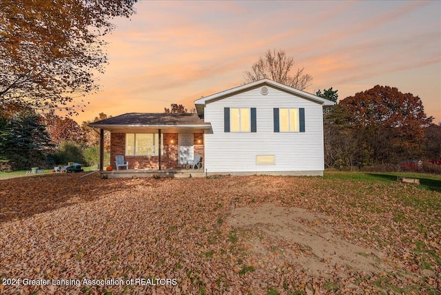 split level home featuring a porch