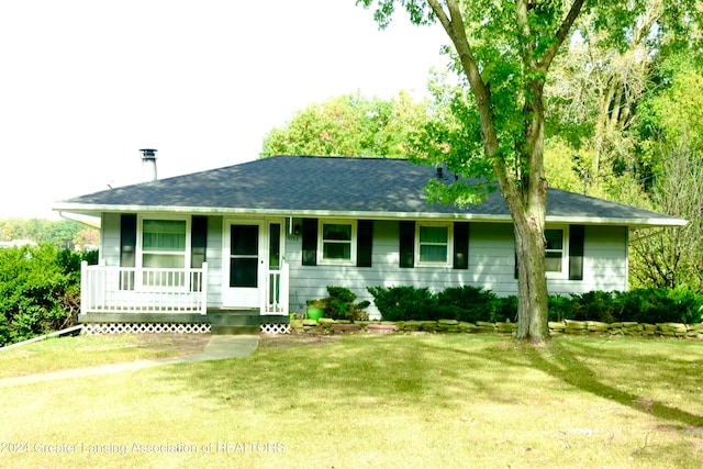 ranch-style home with a porch and a front lawn