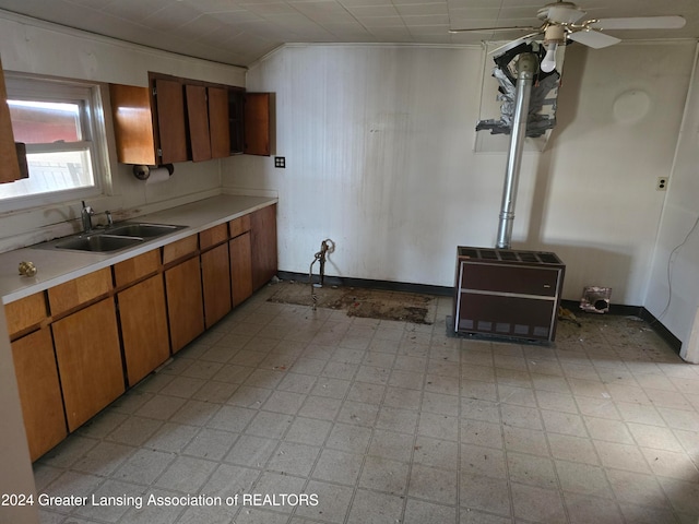 kitchen featuring sink and ceiling fan