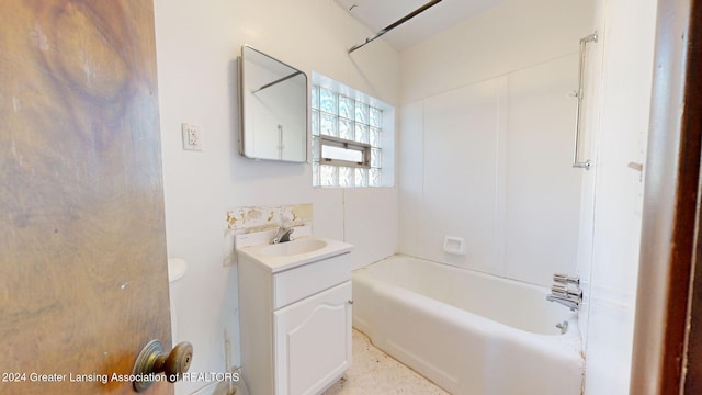 bathroom featuring vanity and shower / washtub combination