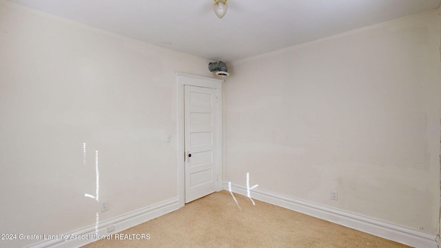 empty room with carpet flooring