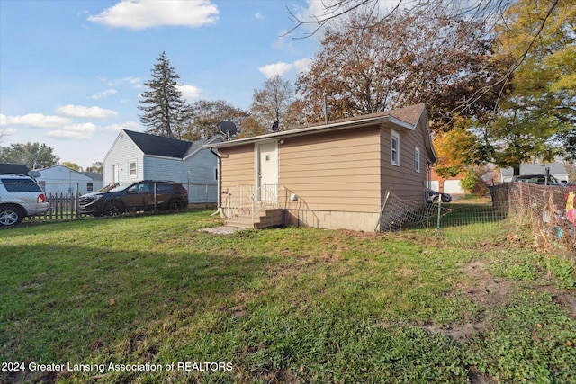 exterior space with a yard