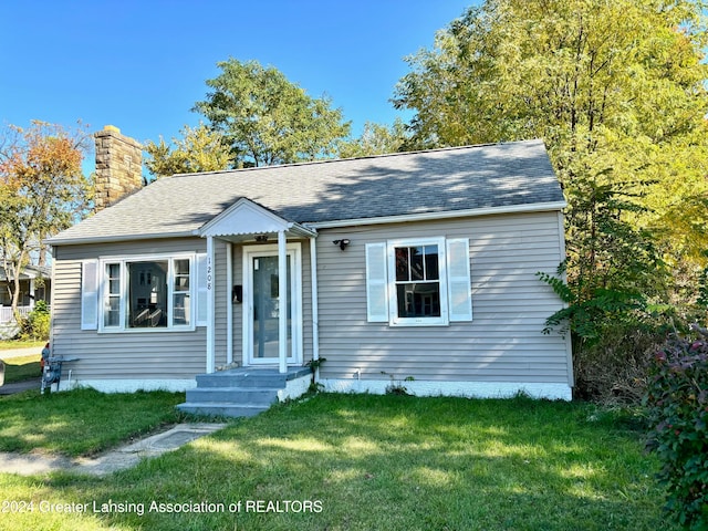 view of front of home with a front yard