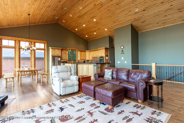 living room featuring light wood-type flooring, high vaulted ceiling, wood ceiling, and a chandelier