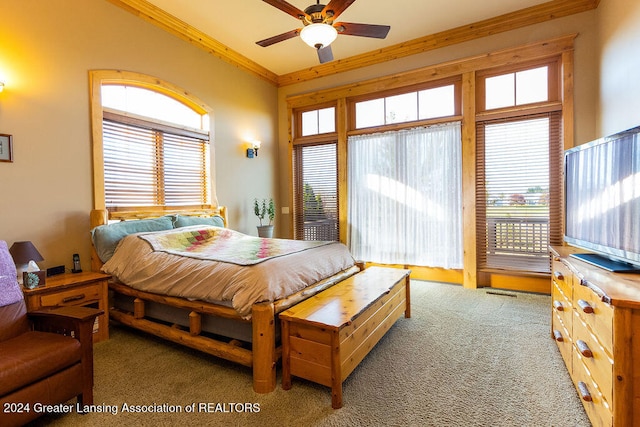 bedroom with crown molding, carpet flooring, and multiple windows