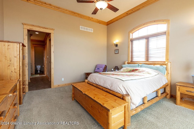 bedroom featuring ornamental molding, carpet, and ceiling fan