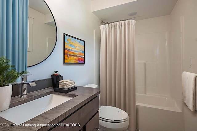 6119 Fresno Ln, East Lansing, MI 48823 - bathroom featuring vanity and shower / bathtub combination with curtain