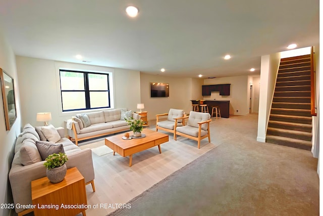 6119 Fresno Ln, East Lansing, MI 48823 - living room with stairway and recessed lighting