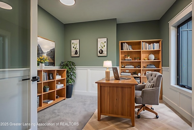 6119 Fresno Ln, East Lansing, MI 48823 - office with wainscoting and a decorative wall