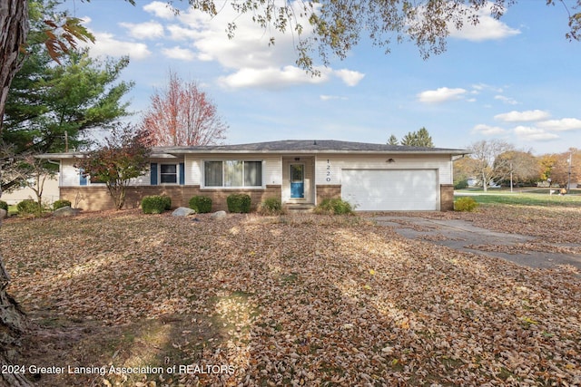 ranch-style home with a garage