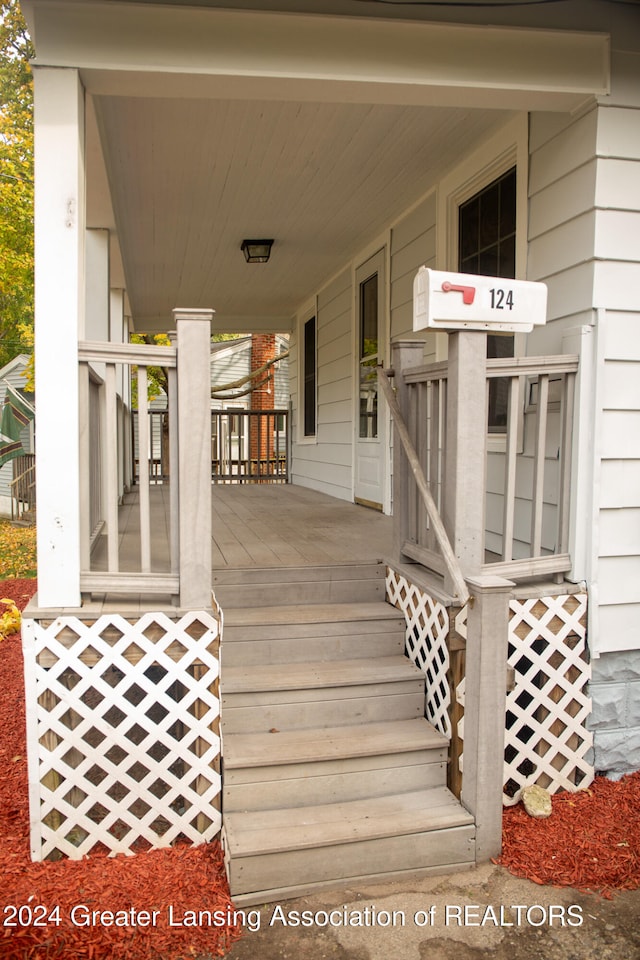 wooden deck featuring a porch