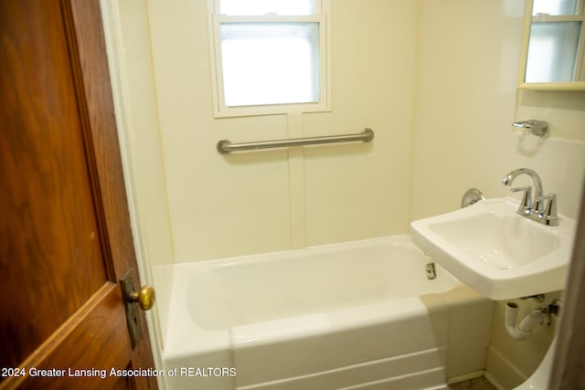 bathroom with sink and a bathtub