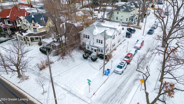 602 N Pennsylvania Ave, Lansing, MI 48912 - snowy aerial view with a residential view