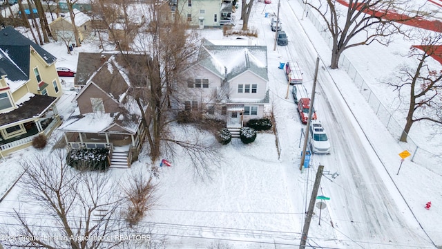 602 N Pennsylvania Ave, Lansing, MI 48912 - snowy aerial view with a residential view