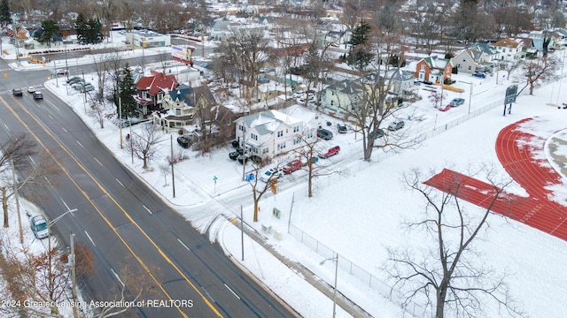 602 N Pennsylvania Ave, Lansing, MI 48912 - snowy aerial view with a residential view