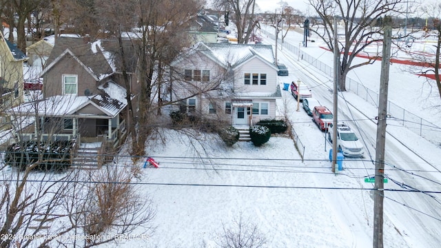 602 N Pennsylvania Ave, Lansing, MI 48912 - yard covered in snow featuring a residential view