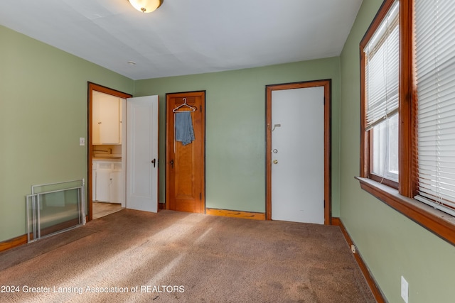 602 N Pennsylvania Ave, Lansing, MI 48912 - unfurnished bedroom featuring carpet flooring and ensuite bath