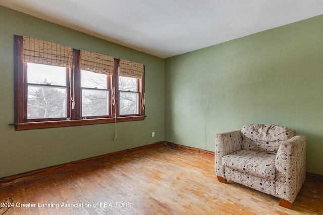 602 N Pennsylvania Ave, Lansing, MI 48912 - sitting room with wood finished floors and baseboards