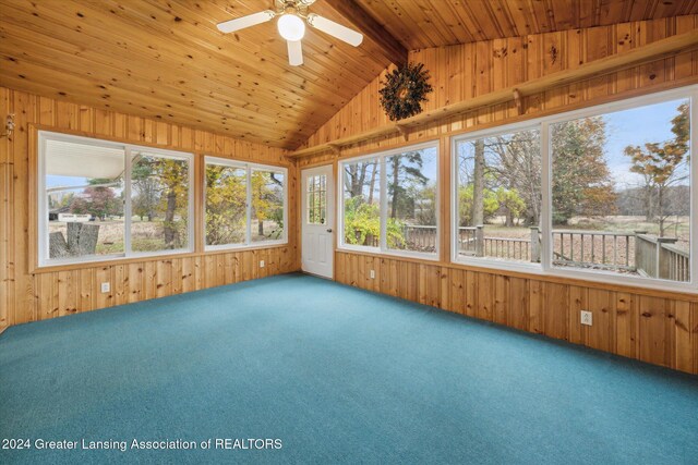 unfurnished sunroom with ceiling fan, wood ceiling, and lofted ceiling with beams