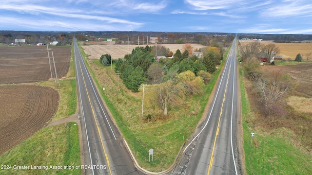 birds eye view of property featuring a rural view