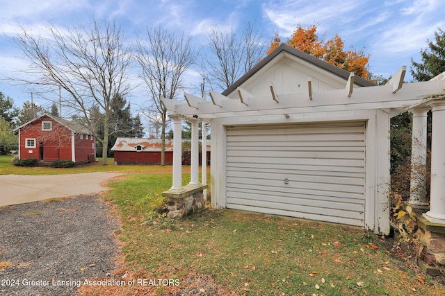 garage with a yard