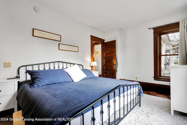 bedroom featuring hardwood / wood-style flooring