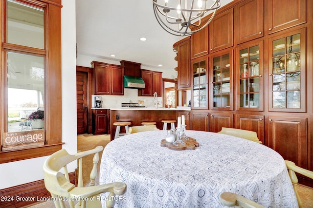 dining area featuring an inviting chandelier