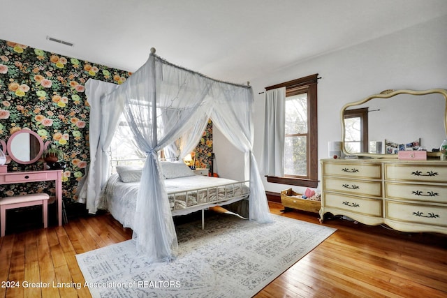 bedroom featuring hardwood / wood-style flooring