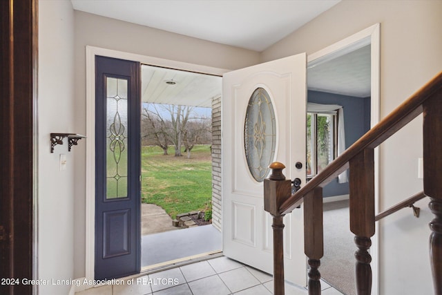 foyer with light tile patterned flooring