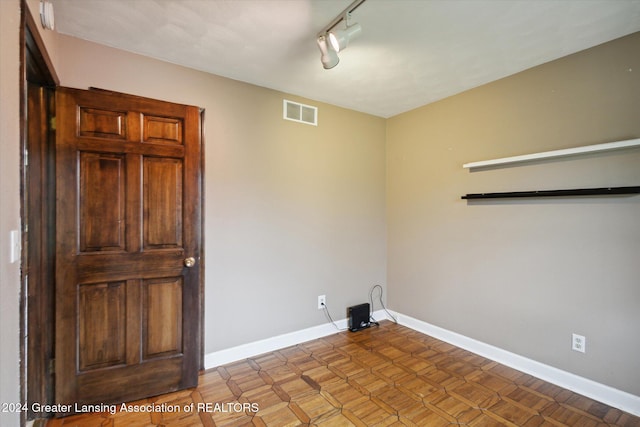 washroom with track lighting