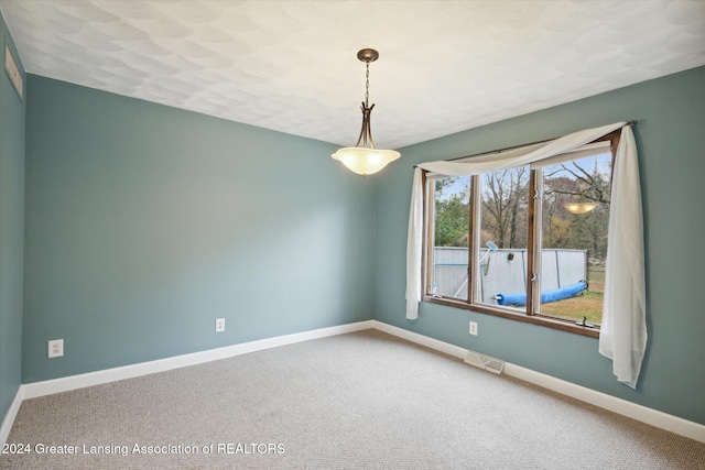 empty room featuring carpet