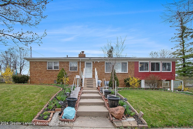 view of front of house with a front yard