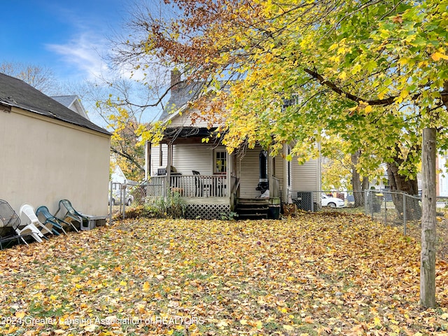 view of yard with covered porch