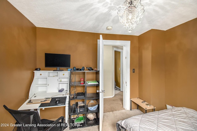 223 S Pennsylvania Ave, Lansing, MI 48912 - bedroom with carpet, a chandelier, a desk, and baseboards