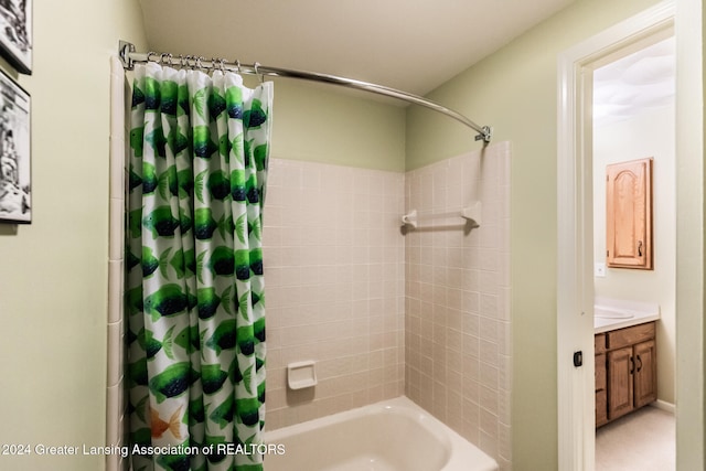 bathroom featuring vanity and shower / tub combo